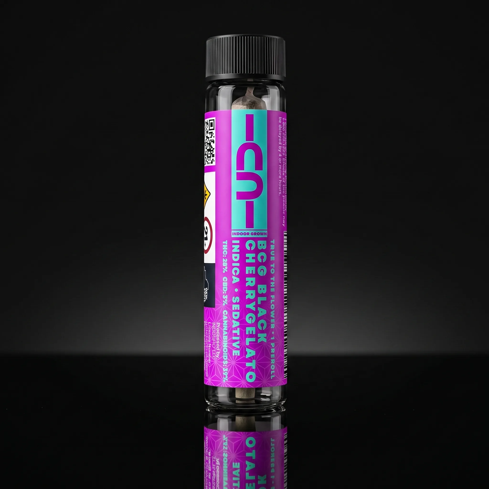 BCG Black Cherry Gelato indica pre-roll on polished black glass, magenta and mint CU label