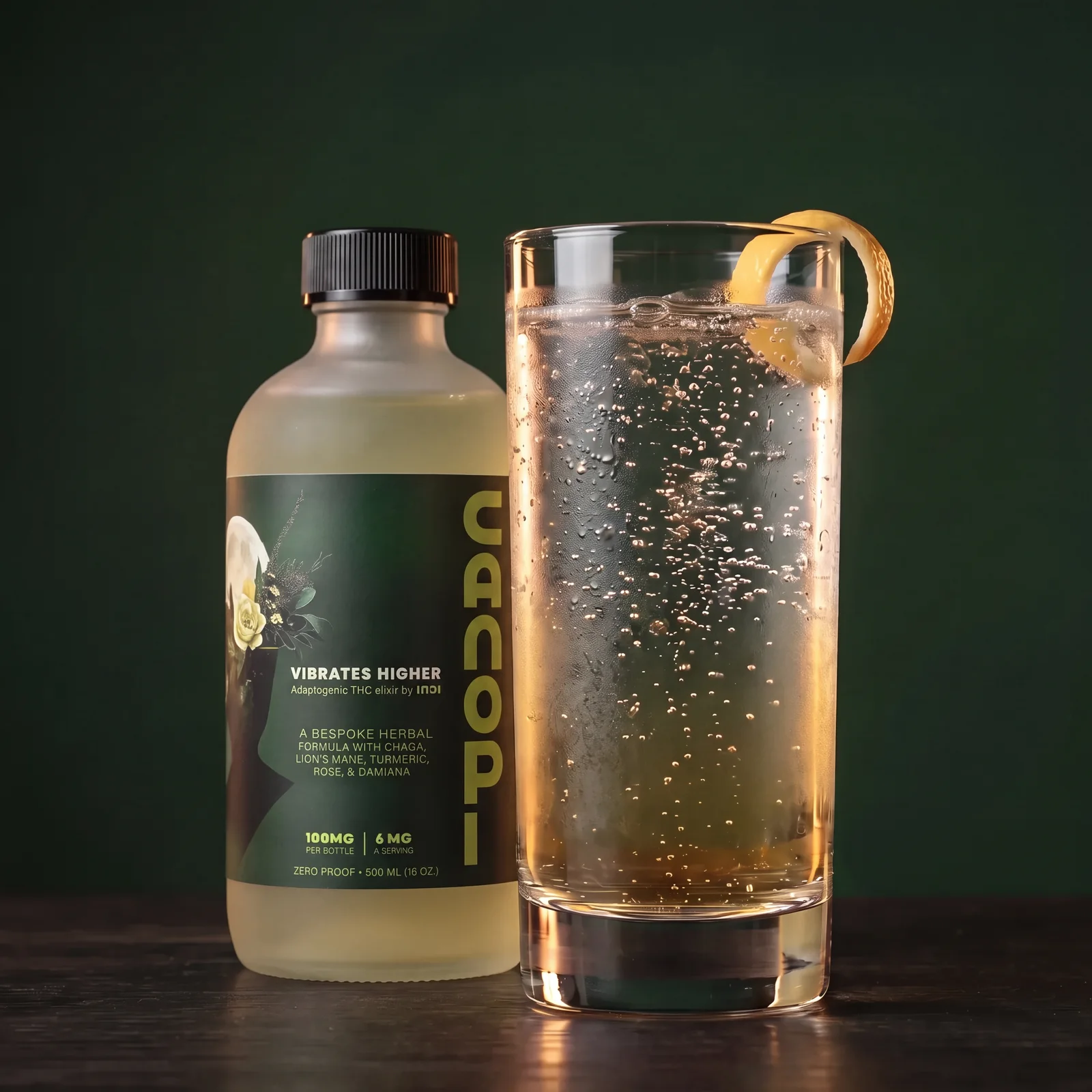 Highball glass of sparkling water tinted with CANOPI elixir